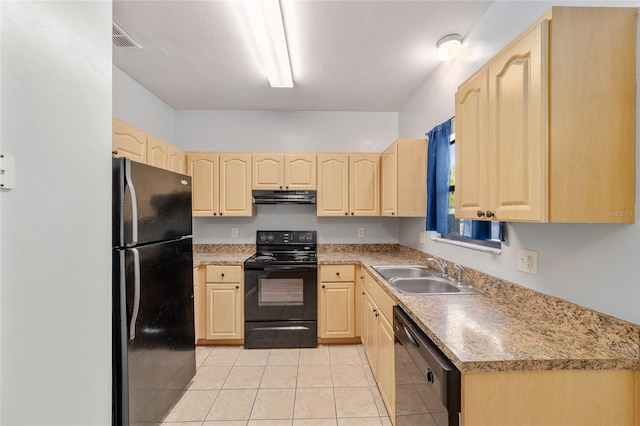 kitchen featuring black appliances, light tile patterned floors, sink, and light brown cabinetry