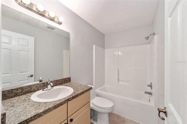 full bathroom with tile patterned flooring, vanity, shower / bath combination, and toilet