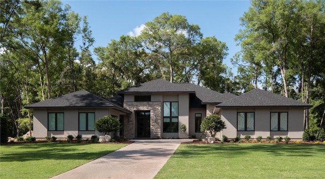 prairie-style house featuring a front yard