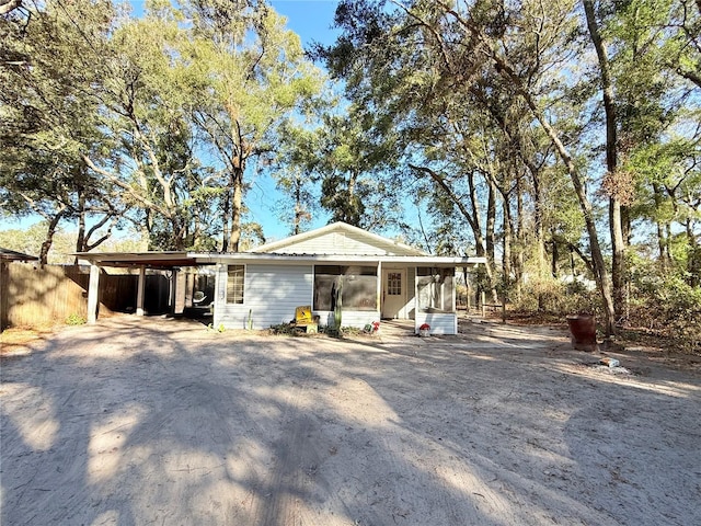 view of front of property with a carport