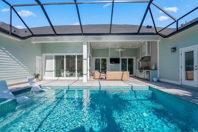 view of pool featuring a lanai, ceiling fan, and a patio