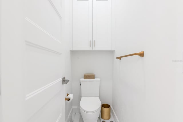 bathroom featuring toilet