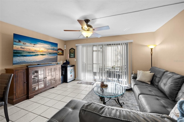 tiled living room featuring ceiling fan