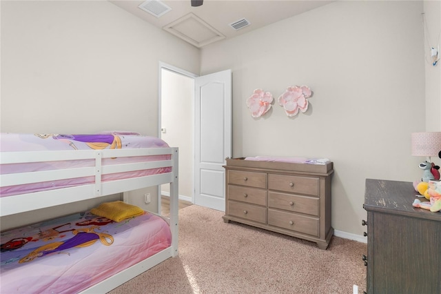 bedroom featuring light colored carpet