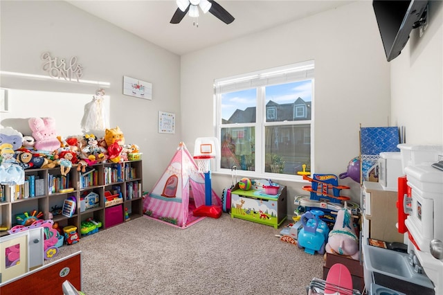 playroom with carpet and ceiling fan