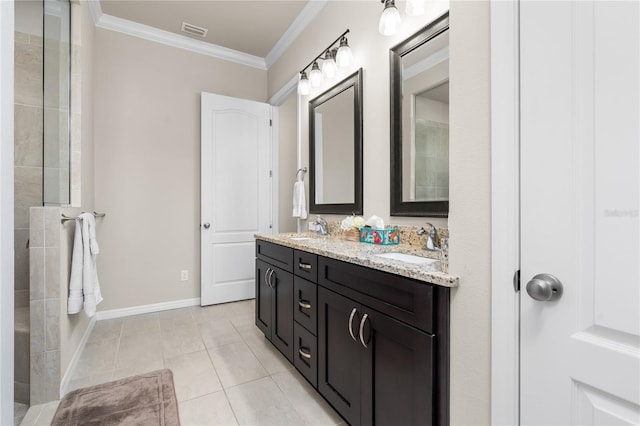 bathroom featuring tile patterned flooring, vanity, and ornamental molding