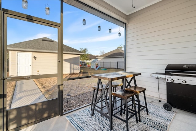 sunroom / solarium with a healthy amount of sunlight