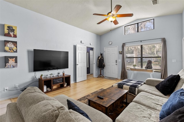 living room featuring ceiling fan, light hardwood / wood-style flooring, and lofted ceiling