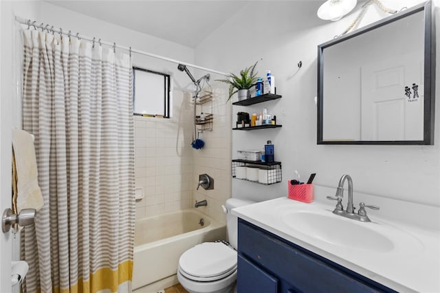 full bathroom with shower / tub combo with curtain, vanity, and toilet