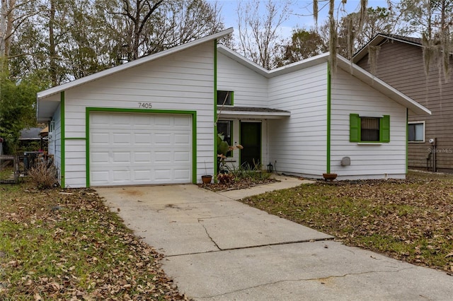 view of front of property featuring a garage