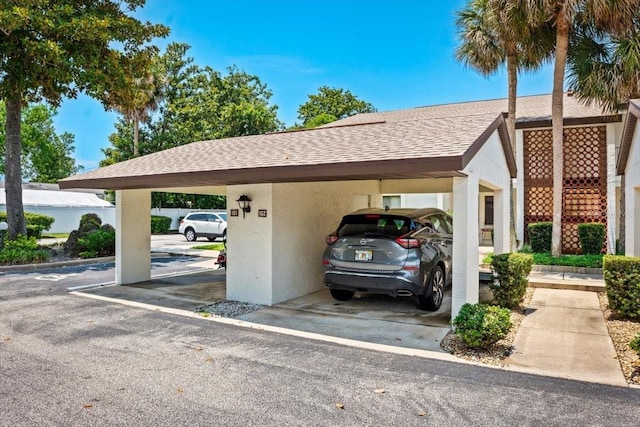 view of parking featuring a carport