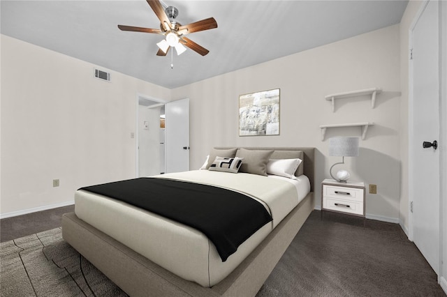 bedroom with dark carpet and ceiling fan