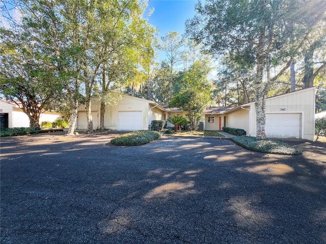 ranch-style home with a garage