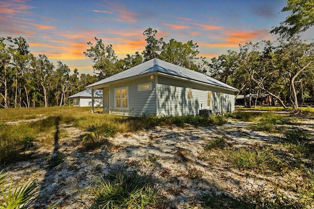 view of property exterior at dusk