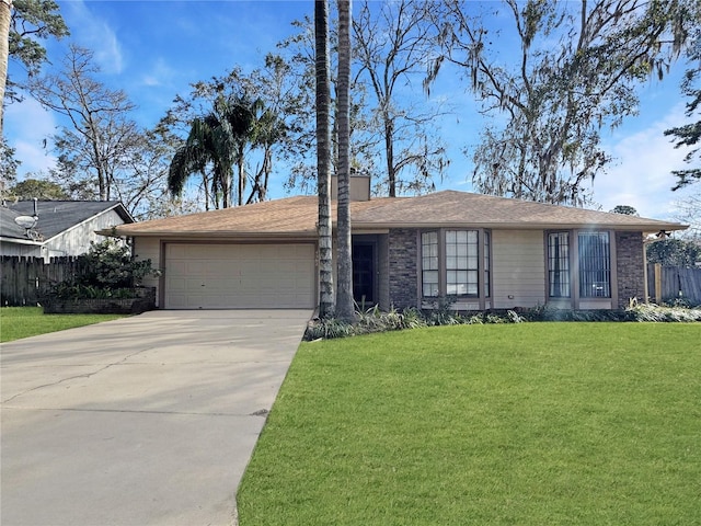 single story home featuring a garage and a front lawn