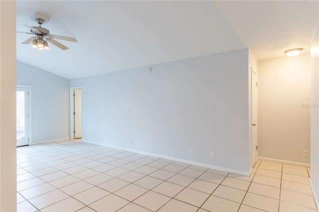 unfurnished room with light tile patterned flooring, lofted ceiling, and ceiling fan