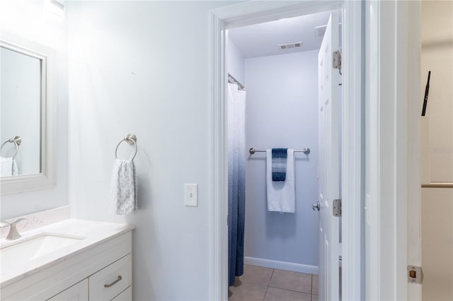 bathroom with vanity, tile patterned floors, and a shower with shower curtain