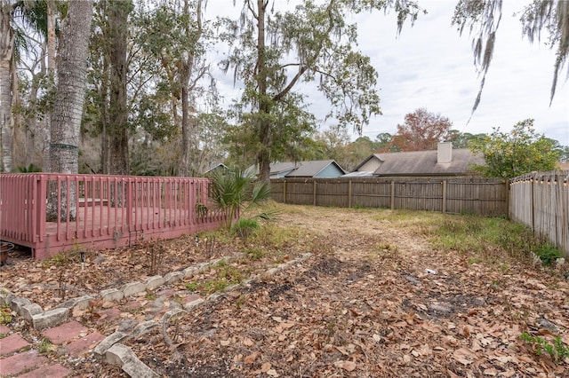 view of yard featuring a deck