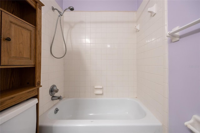 bathroom featuring toilet and shower / bathtub combination