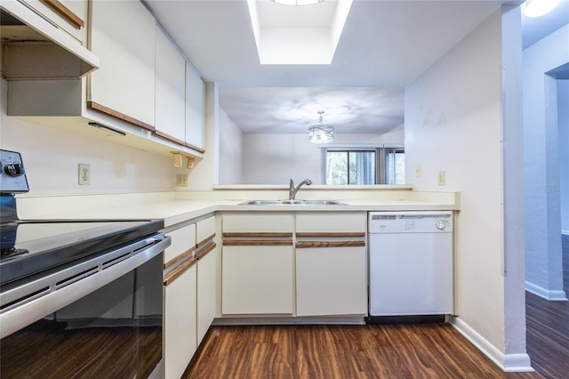 kitchen with dishwasher, dark hardwood / wood-style floors, electric range, white cabinetry, and sink