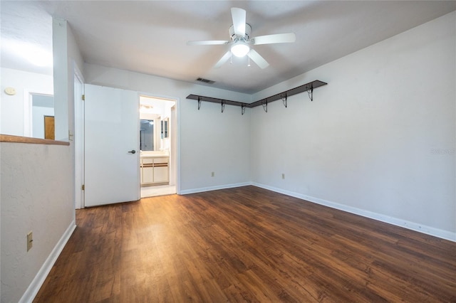 interior space featuring dark hardwood / wood-style flooring and ceiling fan