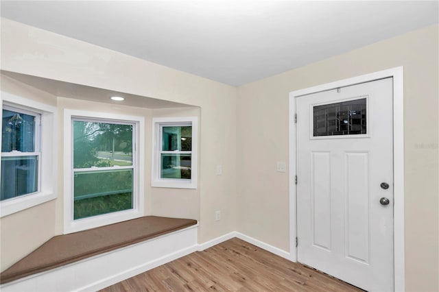 entryway with light hardwood / wood-style floors