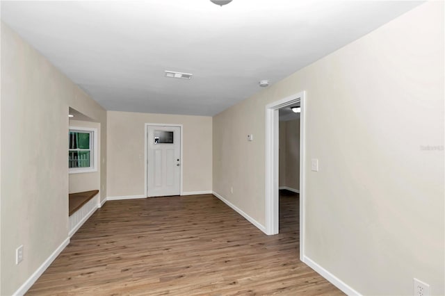 interior space with hardwood / wood-style flooring