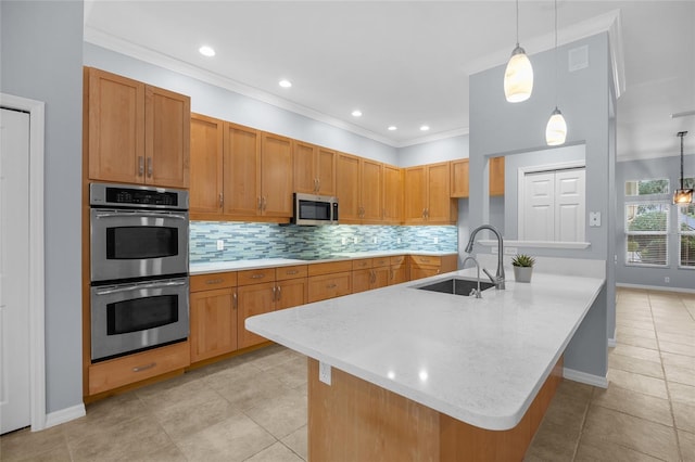 kitchen with hanging light fixtures, stainless steel appliances, decorative backsplash, ornamental molding, and sink