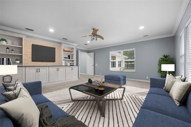 living room featuring light colored carpet, crown molding, and a healthy amount of sunlight