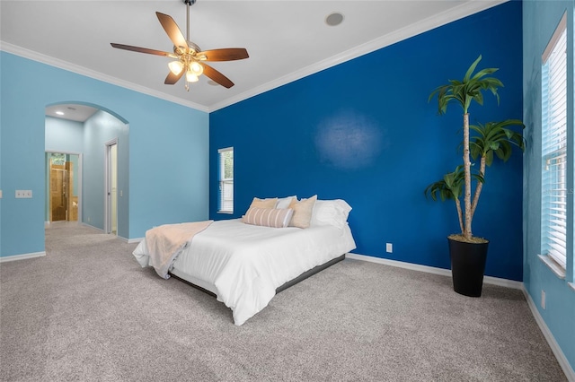 bedroom with carpet floors, ceiling fan, and ornamental molding