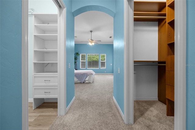 interior space featuring light colored carpet and ornamental molding