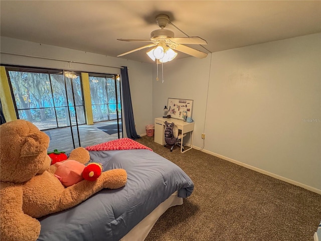 bedroom with ceiling fan and dark carpet