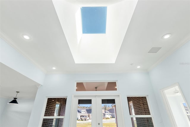 details featuring recessed lighting, ornamental molding, and french doors