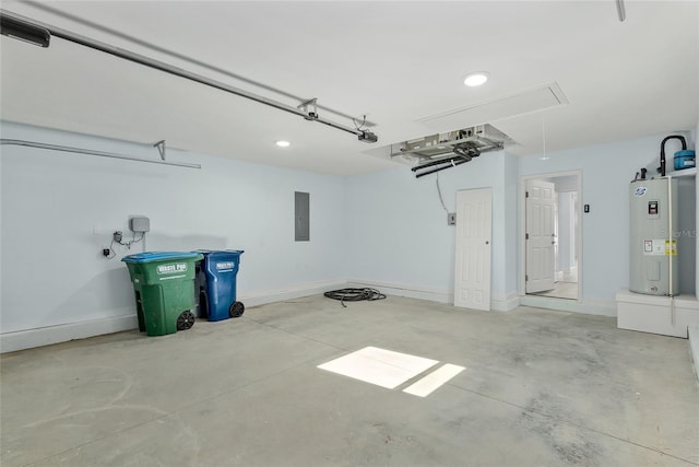 garage with electric panel, baseboards, and electric water heater