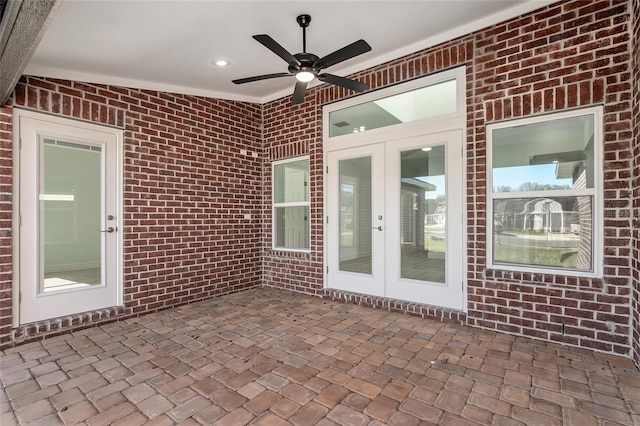 view of patio with ceiling fan and french doors