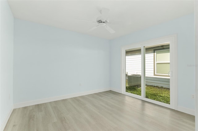 unfurnished room featuring light wood finished floors, ceiling fan, and baseboards