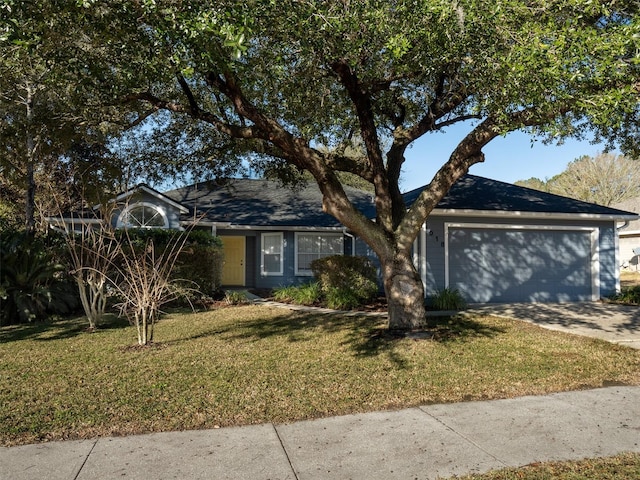 ranch-style house with a front yard and a garage