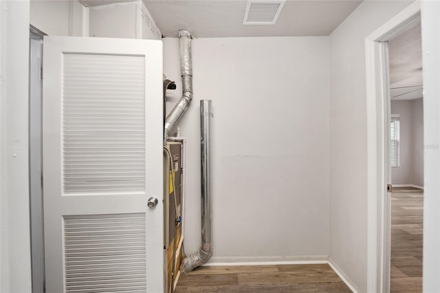 laundry room featuring hardwood / wood-style flooring