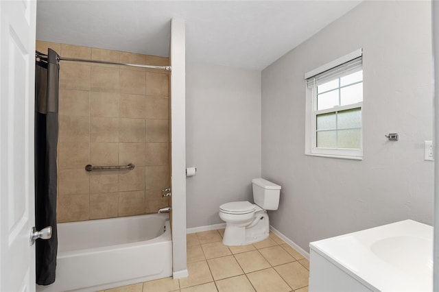 full bathroom with toilet, tile patterned flooring, vanity, and tiled shower / bath combo