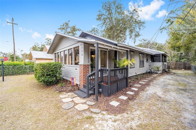 view of front of property with a front lawn