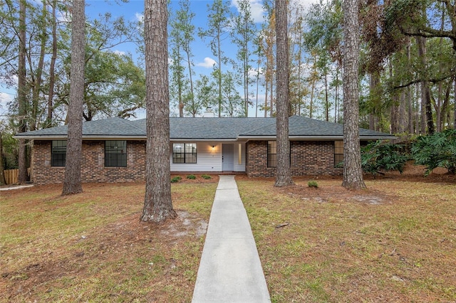 ranch-style house with a front yard