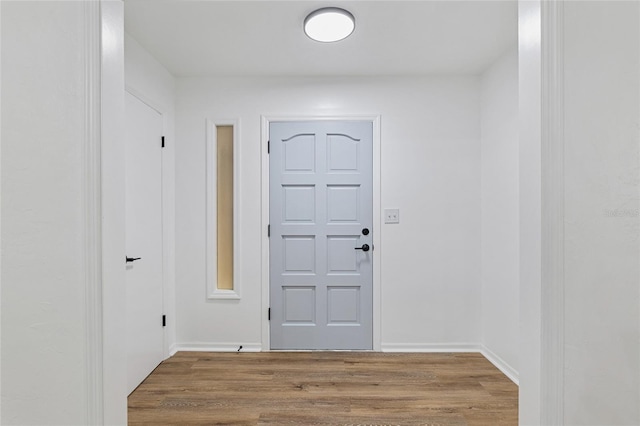 interior space with hardwood / wood-style floors