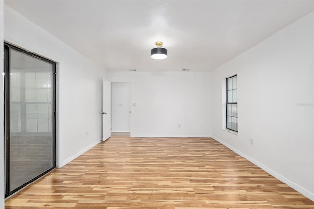 empty room featuring light hardwood / wood-style floors