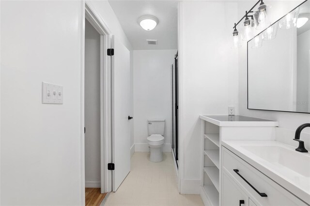 bathroom with toilet and sink