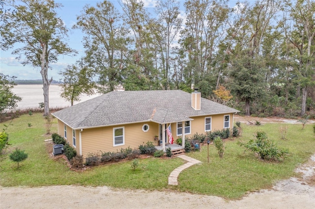 ranch-style house with a front lawn