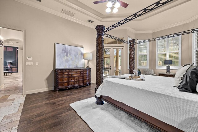 bedroom featuring access to outside, french doors, a raised ceiling, ceiling fan, and ornamental molding