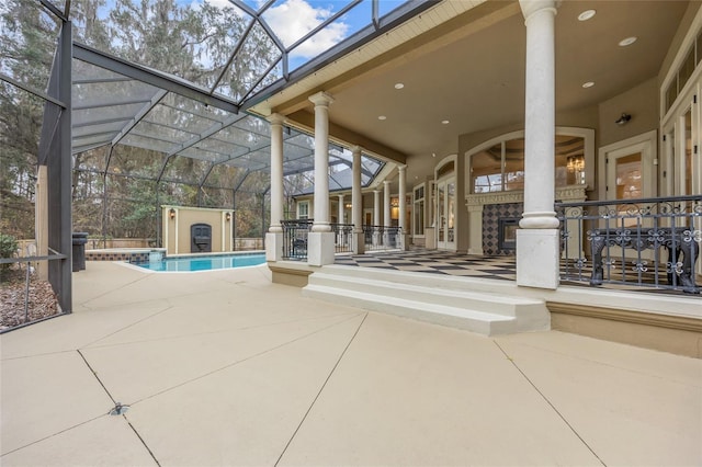 view of patio / terrace with glass enclosure