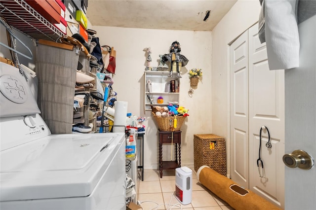 laundry room with light tile patterned floors