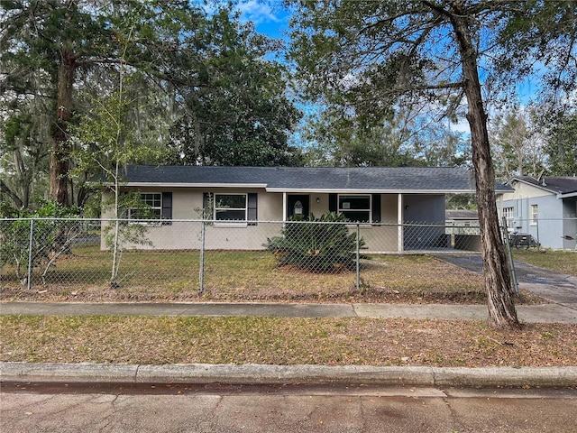 view of front of property with a carport