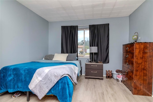 bedroom featuring light wood-type flooring